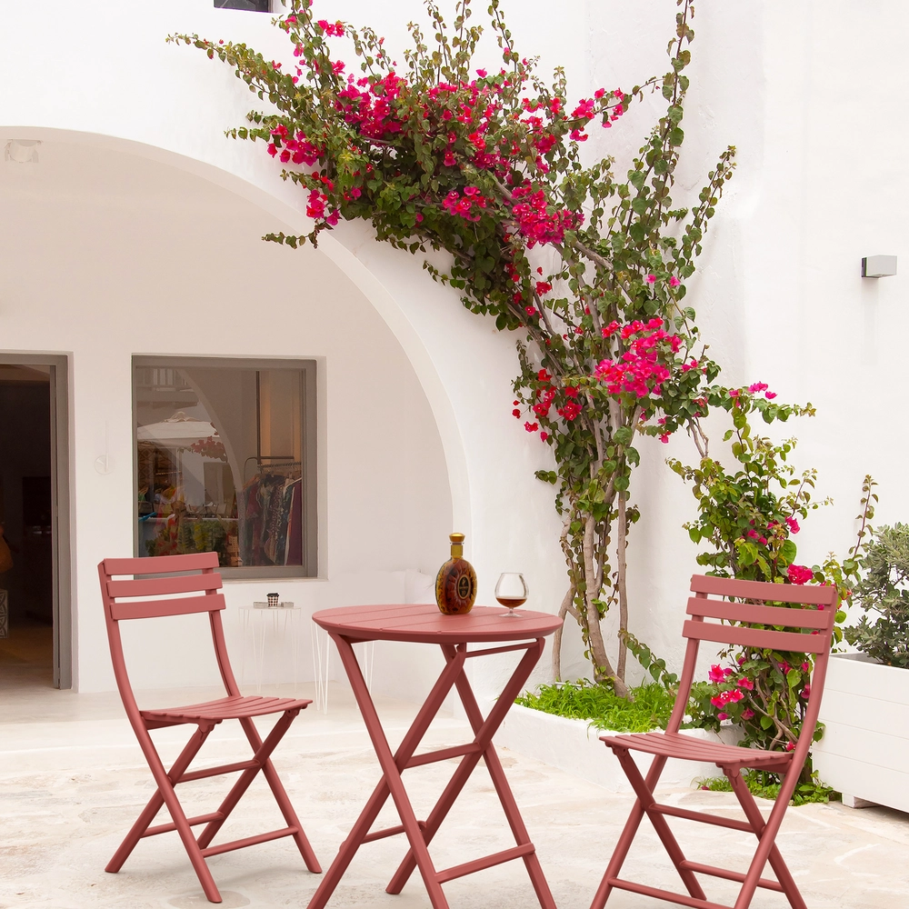 Conjunto sillas HELEN plegables con mesa HELEN redonda en terraza